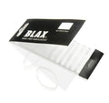 A pack of BLAX Hair Elastics - Clear (8 pcs) by BLAX shows several flexible, clear hair ties arranged in a row, with a few elastics taken out and placed beside the packaging.