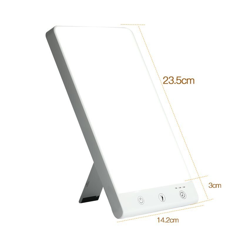 The Fashiongirl Light Therapy Lamp 10,000 lux LED is a rectangular white lamp with touch controls and a built-in stand. Its artificial daylight helps ease winter depression. Dimensions: 23.5 cm tall, 14.2 cm wide, 3 cm thick.