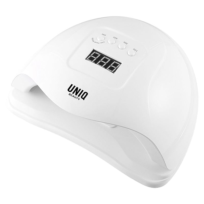 Das UNIQ Nail Starter Kit enthält einen 80-W-UV/LED-Trockner mit digitaler Timeranzeige und Bedientasten, ideal zum Aushärten von Gelnägeln – ein unverzichtbares Werkzeug von UNIQ für Anfänger oder professionelle Nagelbegeisterte.