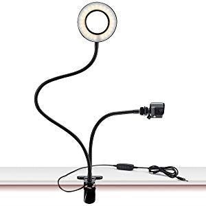 The UNIQ Selfie Ring Light features an adjustable LED with brightness control and two flexible arms—one for your phone, one for the light—plus a clamp base for secure mounting. Ideal for streaming, vlogs, YouTube, or makeup sessions. Includes power cord.