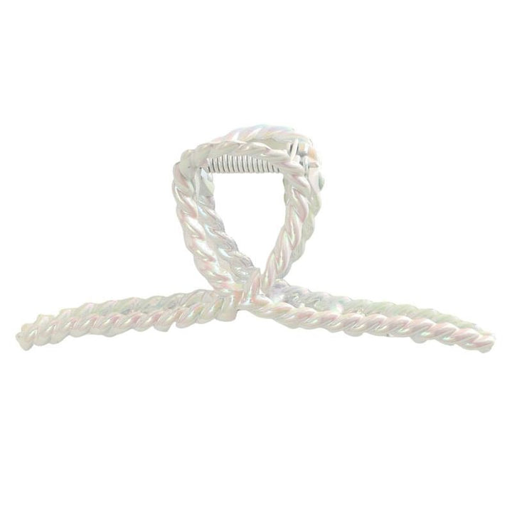 The SOHO Caprina Hair Claw - White by SOHO features an iridescent twisted plastic design with a looped bow and visible metal spring, resembling a unicorn horn and shining against a white background.