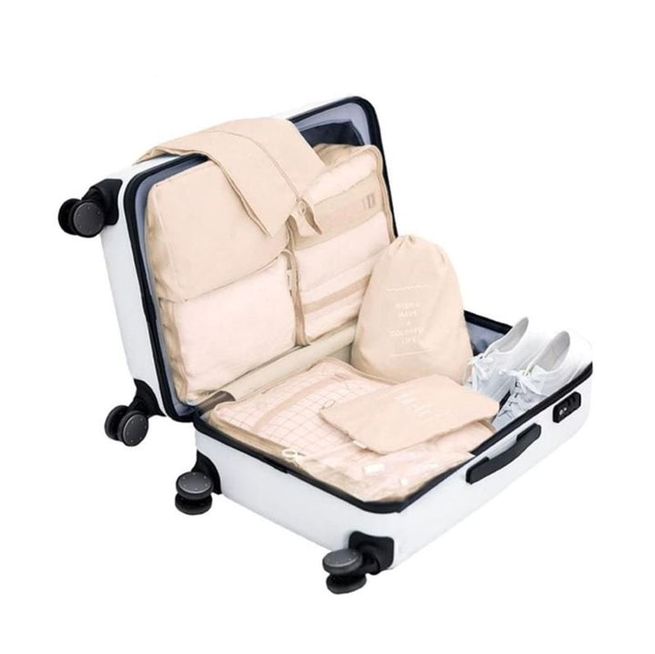 UNIQ Suitcase packing cube set - Perfectly organise and protect your luggage - Beige - 7 pieces - | Fashiongirl